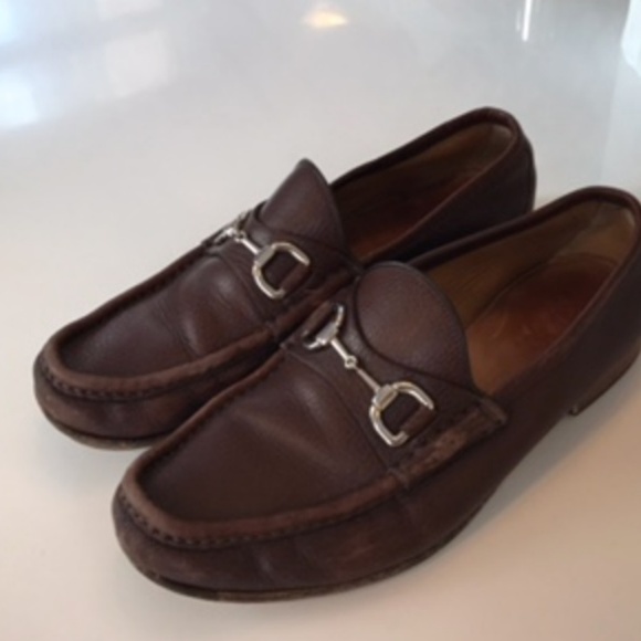 Brown Gucci horse-bit loafers